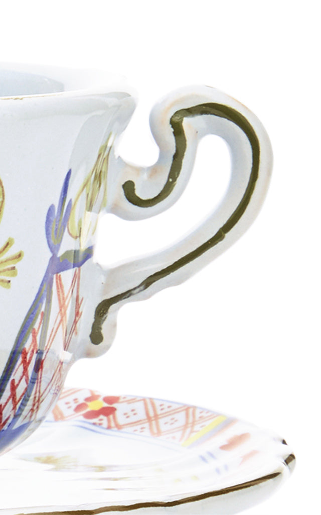 Set-Of-Four Carnation Coffee Cups and Saucers